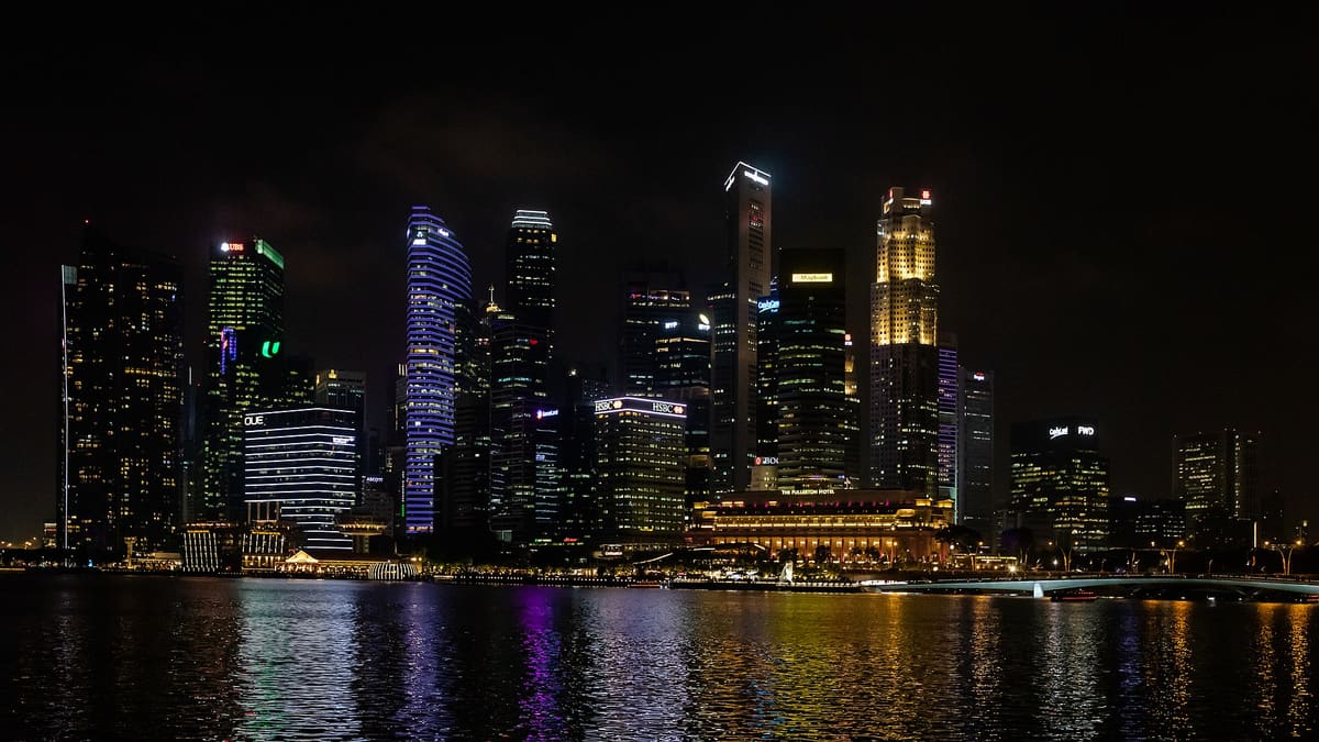 Singapore's Marina Bay skyline at night, the base for a fourth-ranked global startup ecosystem.